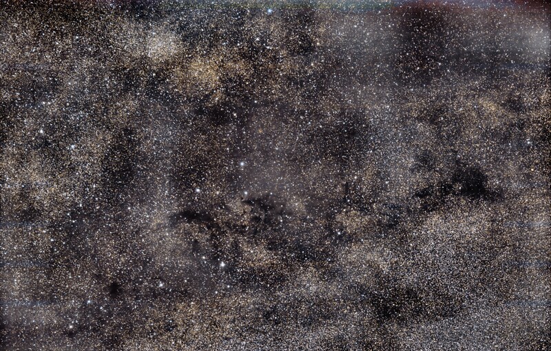 Dark nebula LDN 673 in Aquila from May, 19th, 2023; 207x32 sec; mod. Canon 750d; Samyang 135 mm; no filter; bortle 7-8; North = left! LDN 673 Middle; right = Barnard 330