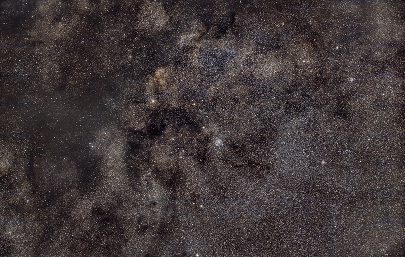 open cluster M 11, widefield from May, 24th, 2023; 239x32sec; Samyang 135mm, mod. Canon 750d; no filter; North = left!; bortle 7-8 in SO/S; several Barnard dark nebulas