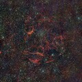 Spaghetti nebula Simeis 147 under foggy sky; from December 17th, 2023; bortle 6; Samyang 135mm + mod. Canon 77d; IDAS V4 filter (60nm GB +16 nm HII); 378x30 sec;