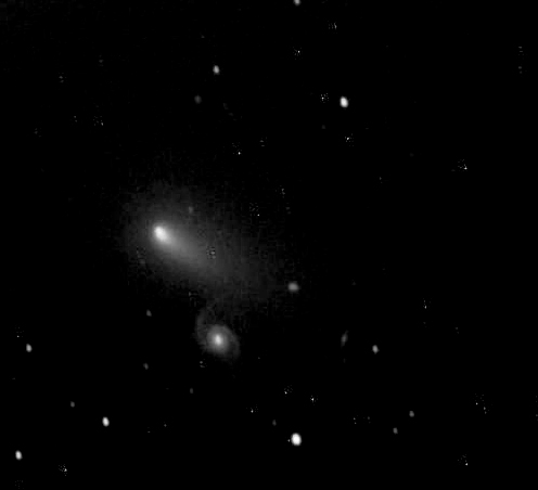 Close conjunction of Comet Leonard and Galaxy NGC 3897.jpg